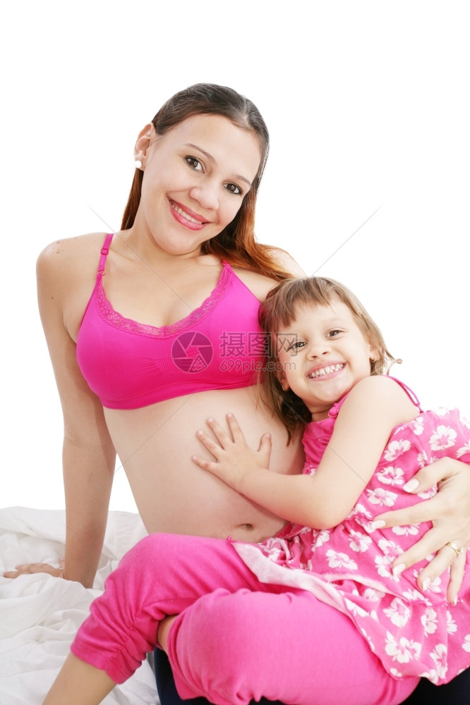 婴儿喜悦女孩与一起怀着美丽的孕妇图片