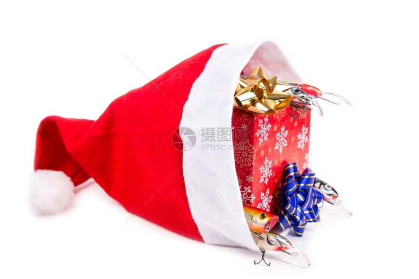 圣诞前夜节和新年礼物以红箱形式赠送为渔民和捕猎者提供圣塔帽用红纸和绘画雪花在目前盒子上钓鱼的诱饵圣诞老人摇晃的图片