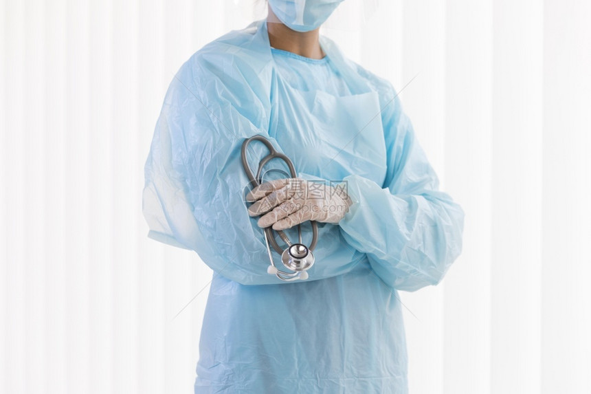 专业的穿着防护服女医生前视图高分辨率照片穿着防护服的女医生前视图高质量照片工业的女图片