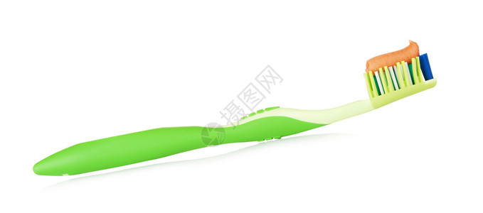 氟化物绿色牙刷配有草药膏在白色绿刷上隔离带草药牙膏保护纯度卫生设计图片