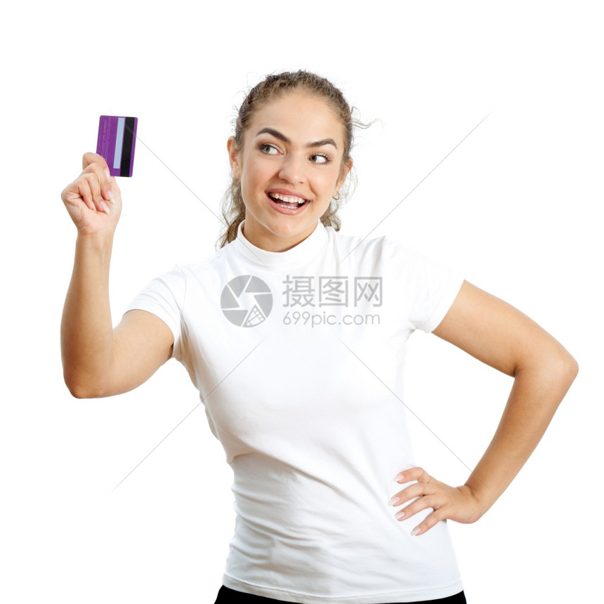 成人青年妇女手里握着信用卡并持有自动柜员机愉快图片