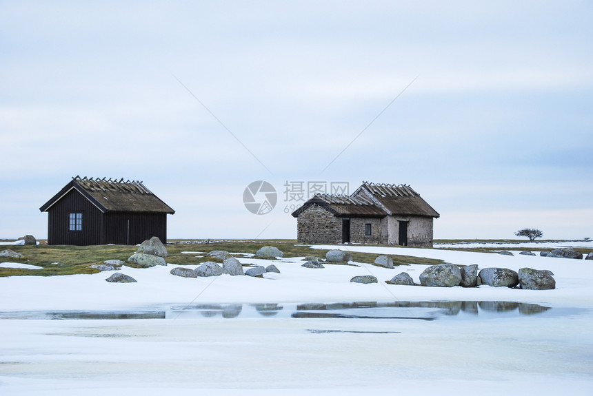 风化欧洲历史渔民在波罗的海瑞典群岛奥兰Oland露天冬季风景中小木屋观图片