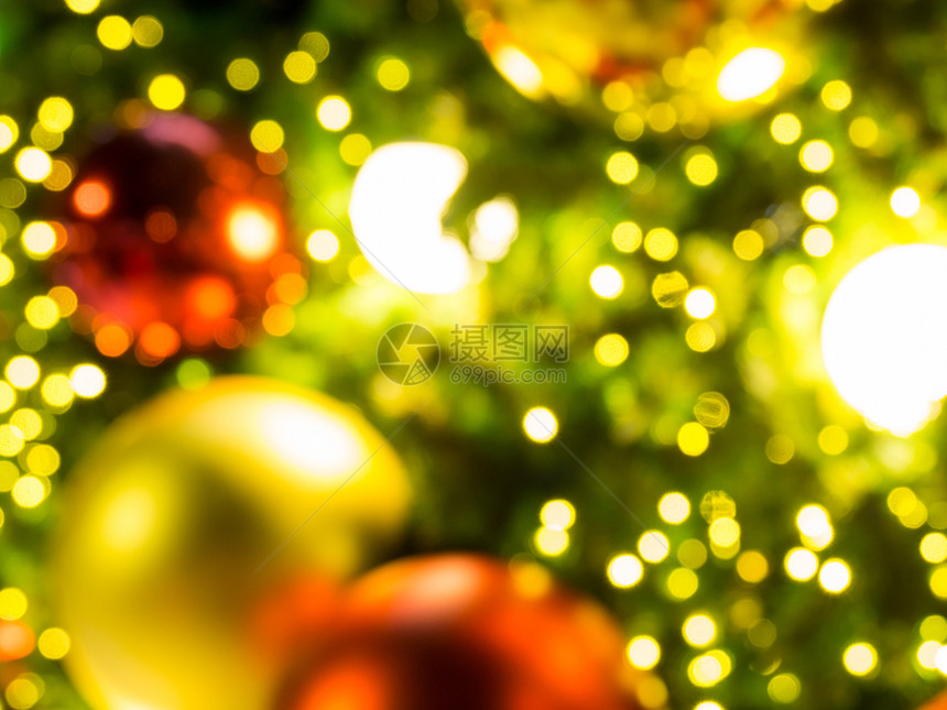 迪斯科Bokeh闪光灯的模糊相片背景圣诞节Bokeh背景布OKh模糊布OKh背景圣诞概念抽象多彩光魅力的图片