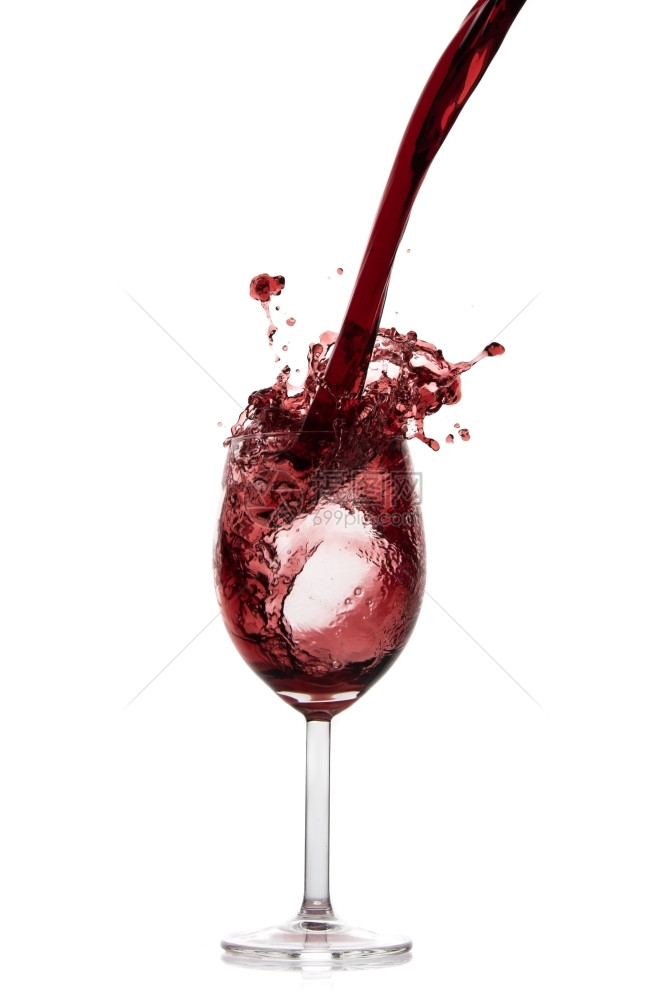诱人的将红酒倒在高柱中以白物隔绝晚餐赤霞珠图片
