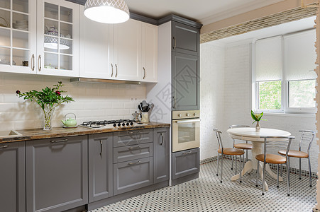 自然内部的现代豪华灰色和白木制厨房内部现代灰色和白木制厨房内部白色的背景图片