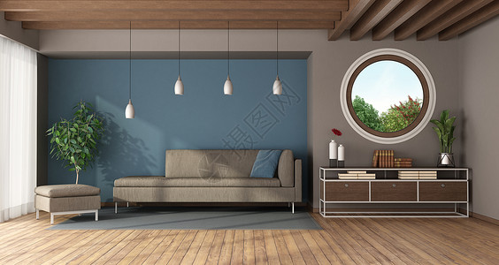 图书白天带圆窗沙发脚凳和餐具柜的蓝色现代客厅3d渲染带圆窗的蓝色现代客厅优雅的设计图片