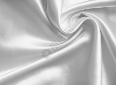 平滑优雅的白色丝绸或纹质可用作婚礼背景自然能够闪亮的图片