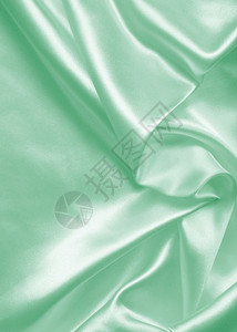 平滑优雅的绿色丝绸或可以用作背景版税柔软度精美的图片