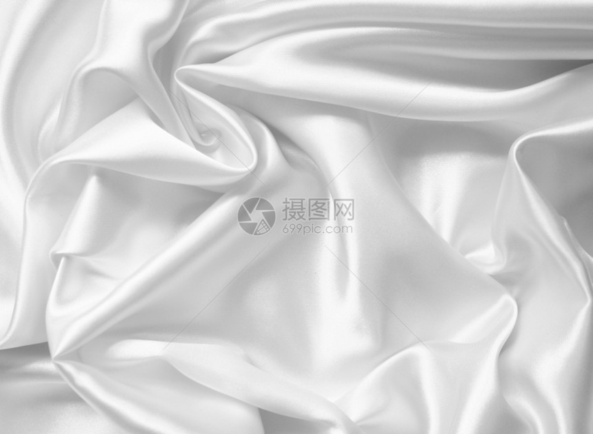 平滑优雅的白色丝绸或可以用作婚礼背景版税抽象的精美图片