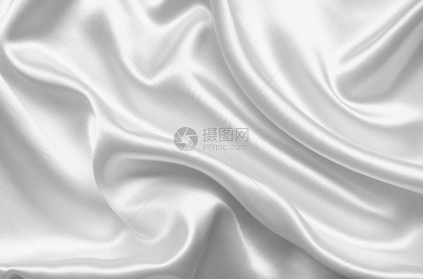 采用时尚平滑优雅的白色丝绸或可以用作婚礼背景艺术图片