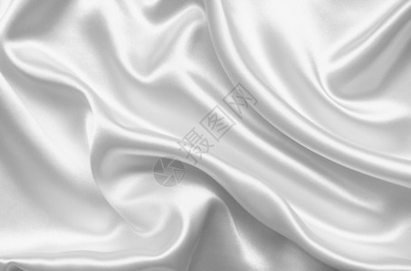 采用时尚平滑优雅的白色丝绸或可以用作婚礼背景艺术图片