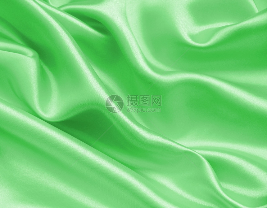 平滑优雅的绿色丝绸或可以用作背景时尚美丽的质地图片