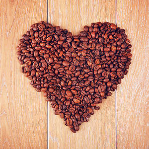 桌上的心形咖啡豆背景背景图片