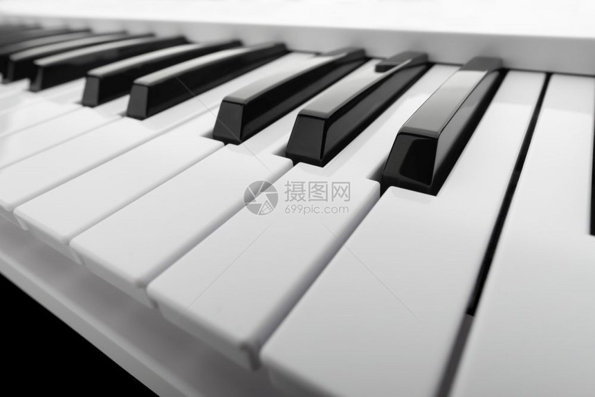闲暇音乐键盘黑白的密钥上有文本复制空间的近切细节为了和谐图片