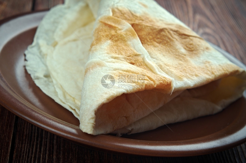 唐杜里黎凡特尤夫卡面团Markook在LevantYufka常见的扁面包是土耳其它是一种薄圆和无叶的平面包与熔岩类似图片