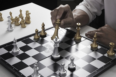 成功王赢玩象棋游戏的商人业战略领导和管理概念及领导和管理概念图片