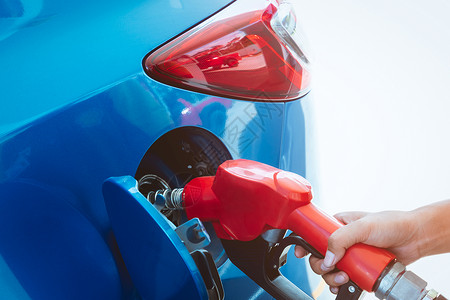 汽车质量在加油站泵喷嘴站工业和服务汽价格石危机概念自动售货图片