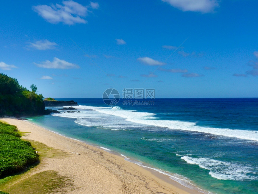 悬崖支撑苏亚克Rochequipleure毛里求斯岛的Gris海滩图片