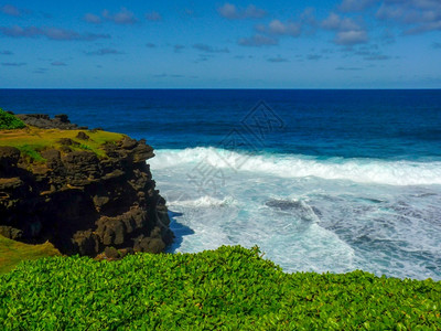 风景优美海洋热带Rochequipleure毛里求斯岛的Gris海滩图片