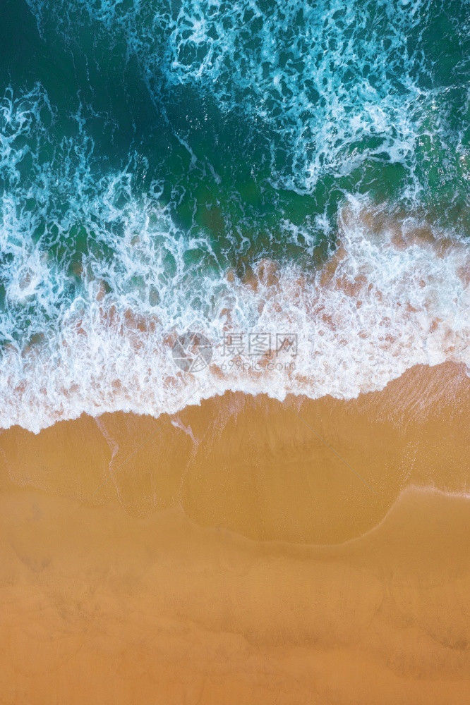 美丽热带蓝色的沙滩上海浪空中观察图片