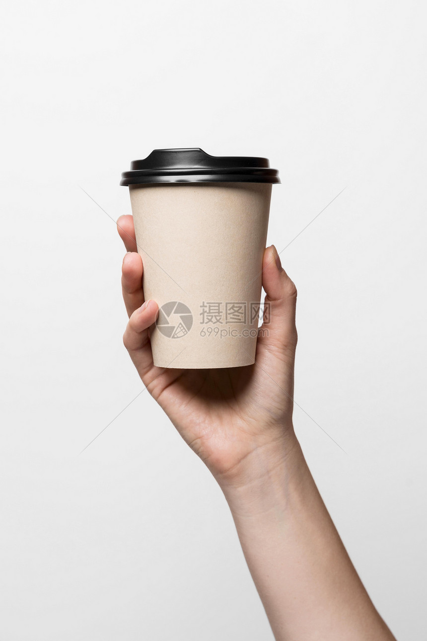 白种人美丽握着咖啡杯的紧手可爱图片