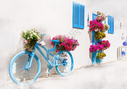 旧自行车和鲜花古老的旧自行车花卉装饰和设计构想等陈装饰型船花板装饰旅游篮子复古的背景图片