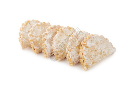 白色的对待不同形状短面包饼干有填充和白色背景上没有孤立的白面早餐图片