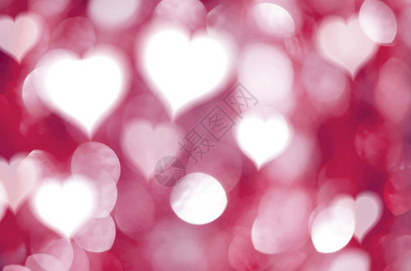 情人节日的抽象红心和色bokeh光背景火花墙纸新的图片