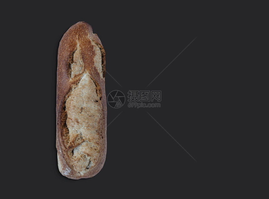晚餐黑色背景的压实小麦面包顶视图文本复制空间木板粮食图片