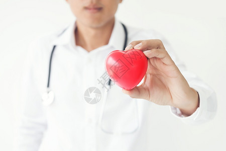 卫生保健携带红心形的医学生与复制空间手持红心形诊断专业的图片