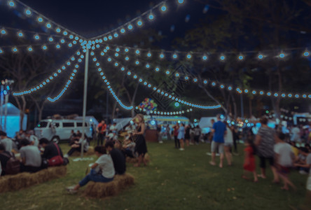 人们食物城市公共园背景反岩过滤效应的夜市节摘要模糊了夜间市场节晚图片