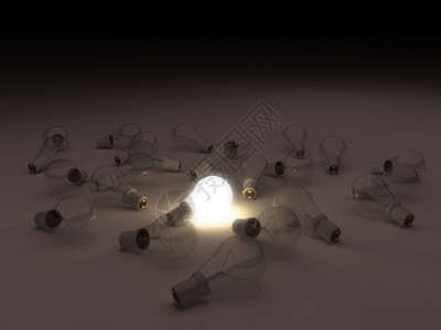 成功在其他破碎的灯泡中有一个照明灯泡动机其中图片