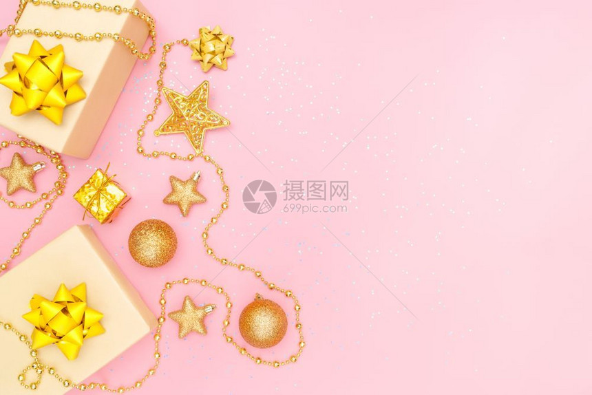 假期颜色生日圣诞节或婚礼仪式用粉红背景的金弓星和球作为礼物箱或送用于生日圣诞节或婚礼仪式五彩纸屑图片