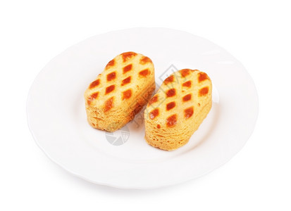 意大利语易碎的糕点酱盘上软杏仁饼干孤立在白色上高清图片