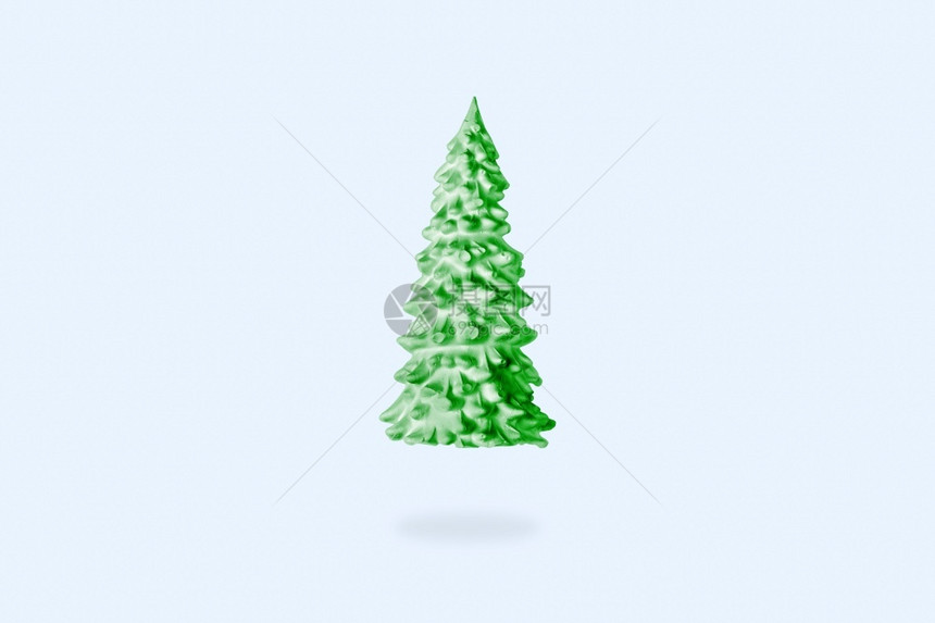 手工制作的网络将绿色圣诞树除去蓝背景新年彩虹装饰品冬天图片