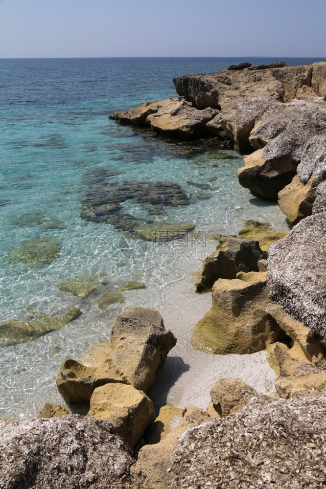 地质学海岸线意大利萨丁亚的IsArutas石英海滩图片