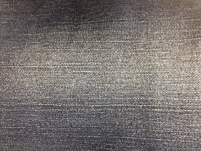 蓝色的Denim织物牛仔裤背景纹身撕裂棉布图片