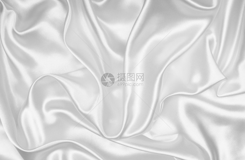 折痕能够白色的平滑优雅白色丝绸或可以用作婚礼背景图片