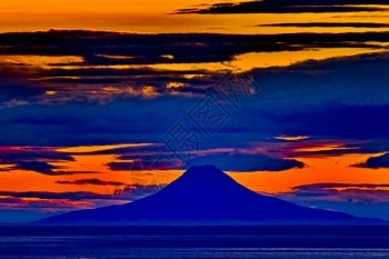 旅游戏剧从阿拉斯加的霍默Hommer看来奥古斯丁火山的日落景色麦金图片