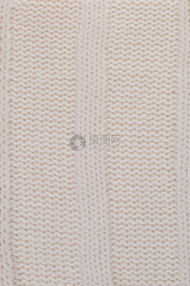 常规的衣服编织物纹理的毛干物纹理白色的套衫图片