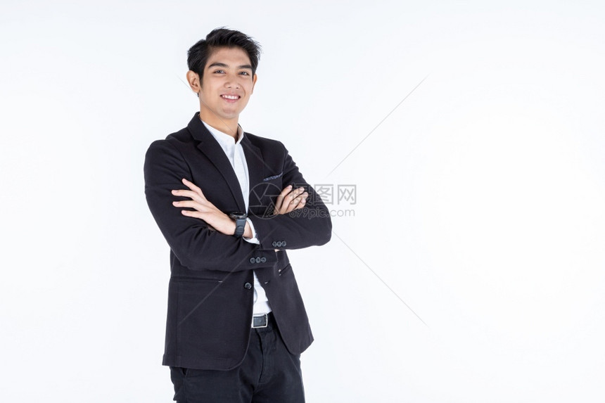 时尚的英俊年轻亚洲男子的肖像手折叠在白灰空复制间工作室背景商业成功概念灰色的生意人自信图片