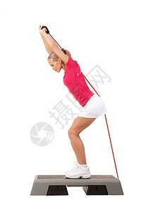 健康年轻美女在楼梯子上做有重量的锻炼运动有氧的图片