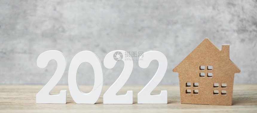 20年新快乐在桌面银行房地产投资金融储蓄和新年决议概念上采用住房模式木制的市场抵押图片