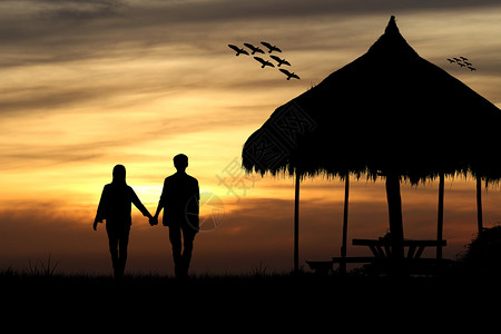 甜的人们浪漫一对夫妇在日落背景的小屋男女情侣的休眠婚礼爱情概念图片
