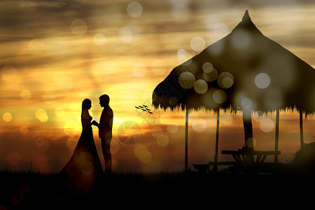 一对夫妇在日落背景的小屋男女情侣的休眠婚礼爱情概念保持男人美丽的图片