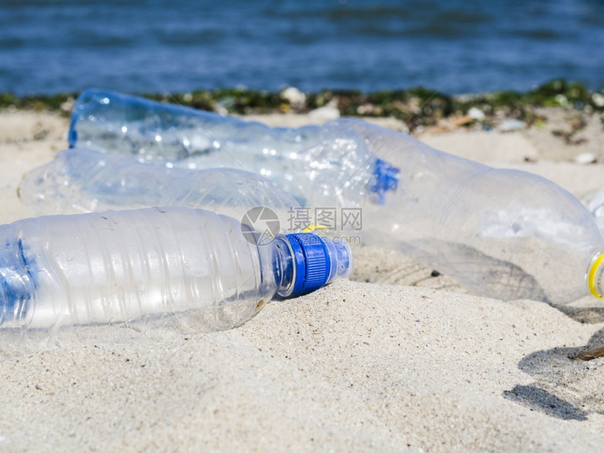 良心透明夏天OLYMPUS数字相机Camera空废水瓶沙滩图片