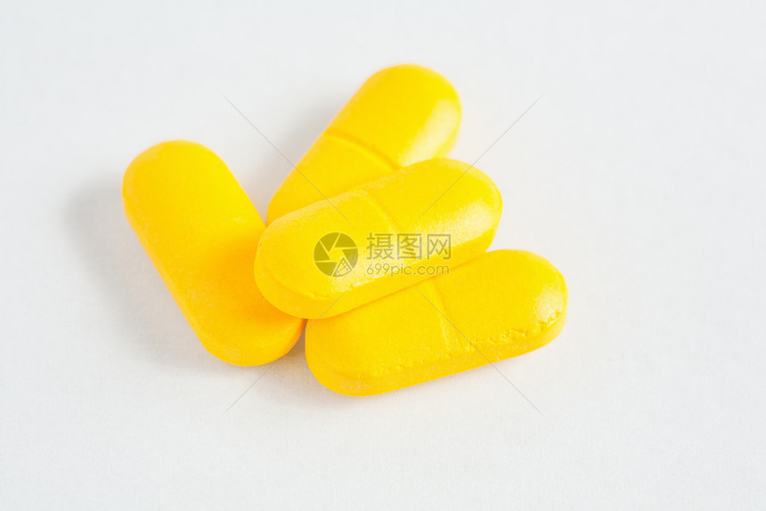 黄色药物胶囊图片