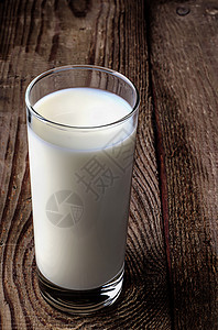 旧桌上的牛奶杯子食物生态产品图片