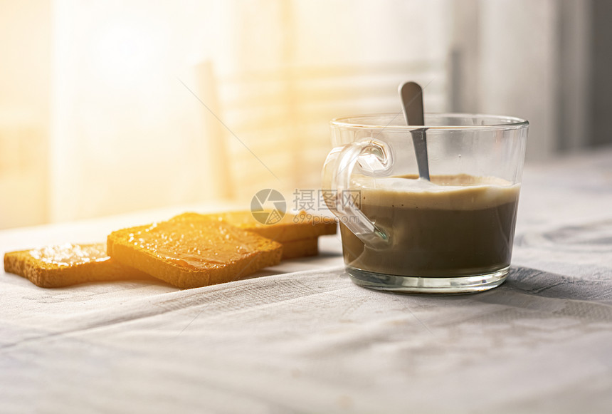 传播新鲜一大群饼干和混杂酱一杯卡布奇诺咖啡在桌子上餐配着装饰的布早餐健康的食物和生活方式饮食图片