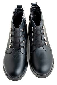 黑色皮靴白底鞋上带扣子和拉链的黑皮靴开机鞋类现代的图片